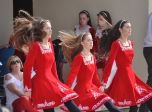 IRISH DANCERS PERFORM ON THE STEPS OF THE CLUB